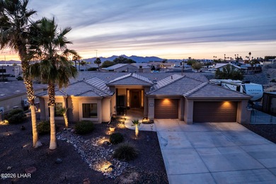Welcome to this beautifully appointed retreat on a 1/3 acre lot on London Bridge Golf Course in Arizona - for sale on GolfHomes.com, golf home, golf lot