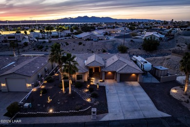Welcome to this beautifully appointed retreat on a 1/3 acre lot on London Bridge Golf Course in Arizona - for sale on GolfHomes.com, golf home, golf lot