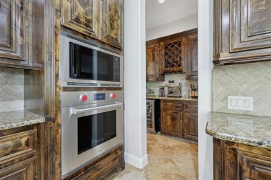 Experience luxury living at its finest in this immaculate custom on The Golf Club at Resort Eagle Mountain Lake in Texas - for sale on GolfHomes.com, golf home, golf lot