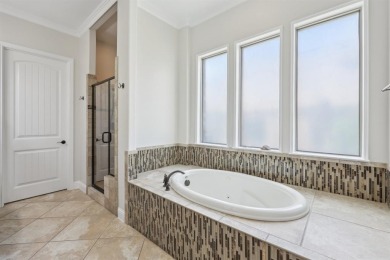Experience luxury living at its finest in this immaculate custom on The Golf Club at Resort Eagle Mountain Lake in Texas - for sale on GolfHomes.com, golf home, golf lot