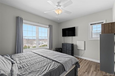 Showings begin Friday, February 20th with Open Houses both on Coyote Preserve Golf Club in Michigan - for sale on GolfHomes.com, golf home, golf lot