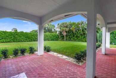 Inside the gated City of Atlantis is this sophisticated on Atlantis Golf Club in Florida - for sale on GolfHomes.com, golf home, golf lot