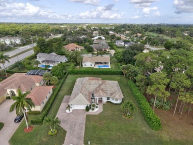 Inside the gated City of Atlantis is this sophisticated on Atlantis Golf Club in Florida - for sale on GolfHomes.com, golf home, golf lot