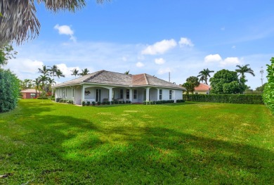 Inside the gated City of Atlantis is this sophisticated on Atlantis Golf Club in Florida - for sale on GolfHomes.com, golf home, golf lot