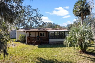 Charming  Affordable Cottage Retreat! This delightful home sits on Plantation Golf Club in Florida - for sale on GolfHomes.com, golf home, golf lot