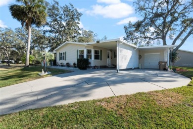 Charming  Affordable Cottage Retreat! This delightful home sits on Plantation Golf Club in Florida - for sale on GolfHomes.com, golf home, golf lot