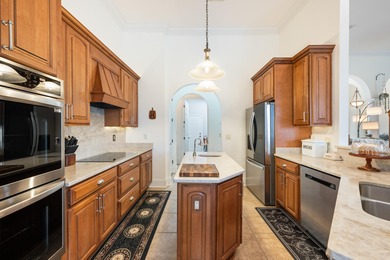 Experience luxury living in this exquisite custom-built Hidden on The Club At Hidden Creek in Florida - for sale on GolfHomes.com, golf home, golf lot