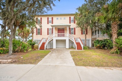 Located on the serene salt marsh with sweeping deep-water views on Ocean Creek Golf Course in South Carolina - for sale on GolfHomes.com, golf home, golf lot