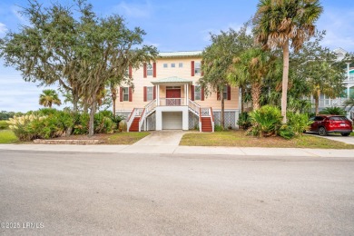 Located on the serene salt marsh with sweeping deep-water views on Ocean Creek Golf Course in South Carolina - for sale on GolfHomes.com, golf home, golf lot