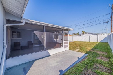 Welcome to your dream home, perfectly situated just moments from on Mangrove Bay Golf Course in Florida - for sale on GolfHomes.com, golf home, golf lot