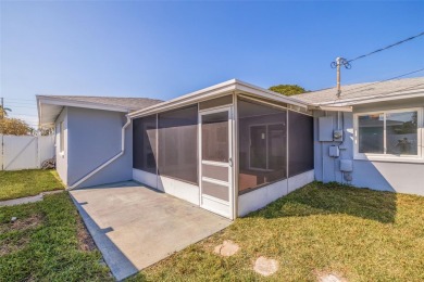 Welcome to your dream home, perfectly situated just moments from on Mangrove Bay Golf Course in Florida - for sale on GolfHomes.com, golf home, golf lot