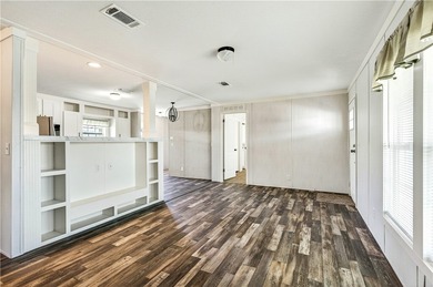 Start fresh in Barefoot Bay! This brand new manufactured home is on Barefoot Bay Golf Course in Florida - for sale on GolfHomes.com, golf home, golf lot