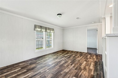 Start fresh in Barefoot Bay! This brand new manufactured home is on Barefoot Bay Golf Course in Florida - for sale on GolfHomes.com, golf home, golf lot