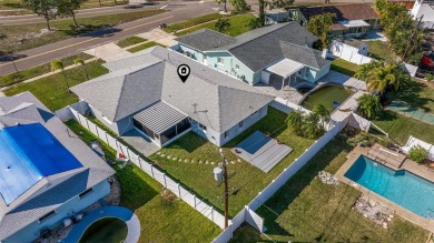 Welcome to your dream home, perfectly situated just moments from on Mangrove Bay Golf Course in Florida - for sale on GolfHomes.com, golf home, golf lot