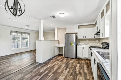 Start fresh in Barefoot Bay! This brand new manufactured home is on Barefoot Bay Golf Course in Florida - for sale on GolfHomes.com, golf home, golf lot