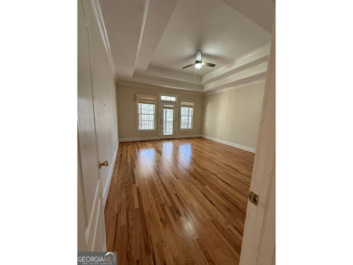 Nestled in the prestigious Orchard neighborhood, this stunning on The Orchard Golf and Country Club in Georgia - for sale on GolfHomes.com, golf home, golf lot