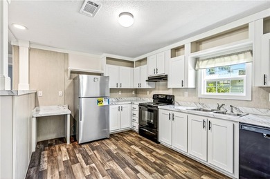 Start fresh in Barefoot Bay! This brand new manufactured home is on Barefoot Bay Golf Course in Florida - for sale on GolfHomes.com, golf home, golf lot