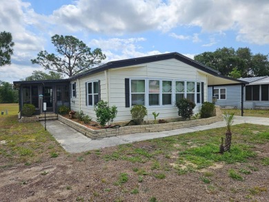 Spanish Village is an affordable housing choice for active on Plantation Golf Club in Florida - for sale on GolfHomes.com, golf home, golf lot