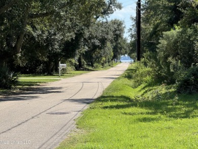 This fantastic lot features numerous adolescent oak trees on The Bridges Golf Club At Hollywood Casino in Mississippi - for sale on GolfHomes.com, golf home, golf lot
