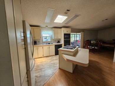 Spanish Village is an affordable housing choice for active on Plantation Golf Club in Florida - for sale on GolfHomes.com, golf home, golf lot