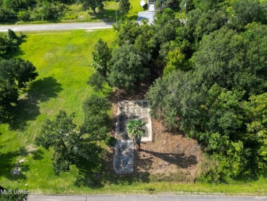 This fantastic lot features numerous adolescent oak trees on The Bridges Golf Club At Hollywood Casino in Mississippi - for sale on GolfHomes.com, golf home, golf lot