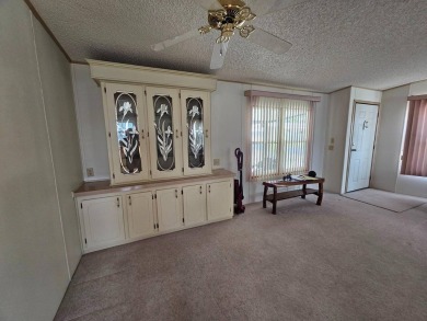 Spanish Village is an affordable housing choice for active on Plantation Golf Club in Florida - for sale on GolfHomes.com, golf home, golf lot
