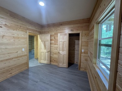 NEW CONSTRUCTION!! Darling cabin in the woods! Located in a on Rayburn Country Club in Texas - for sale on GolfHomes.com, golf home, golf lot