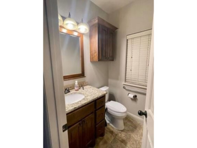 *Situated on the prestigious Hole 1 of Chamberlyne Golf Course on Chamberlyne Country Club in Arkansas - for sale on GolfHomes.com, golf home, golf lot