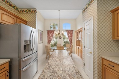 Here is the home you have been waiting for! This SANIBEL model on Eagle Ridge At Spruce Creek Country Club in Florida - for sale on GolfHomes.com, golf home, golf lot