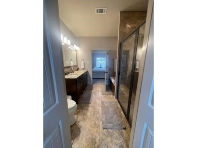 *Situated on the prestigious Hole 1 of Chamberlyne Golf Course on Chamberlyne Country Club in Arkansas - for sale on GolfHomes.com, golf home, golf lot