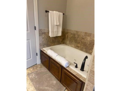 *Situated on the prestigious Hole 1 of Chamberlyne Golf Course on Chamberlyne Country Club in Arkansas - for sale on GolfHomes.com, golf home, golf lot