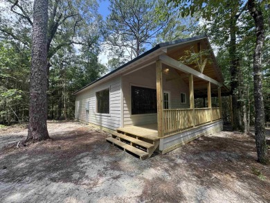 NEW CONSTRUCTION!! Darling cabin in the woods! Located in a on Rayburn Country Club in Texas - for sale on GolfHomes.com, golf home, golf lot