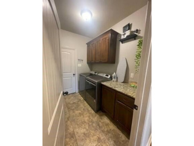 *Situated on the prestigious Hole 1 of Chamberlyne Golf Course on Chamberlyne Country Club in Arkansas - for sale on GolfHomes.com, golf home, golf lot