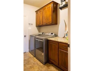 *Situated on the prestigious Hole 1 of Chamberlyne Golf Course on Chamberlyne Country Club in Arkansas - for sale on GolfHomes.com, golf home, golf lot