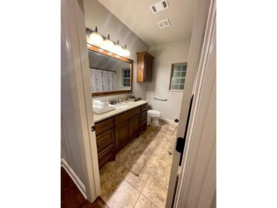 *Situated on the prestigious Hole 1 of Chamberlyne Golf Course on Chamberlyne Country Club in Arkansas - for sale on GolfHomes.com, golf home, golf lot