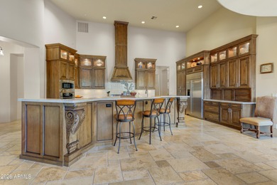 NEWLY UPDATED KITCHEN AND BUTLER'S PANTRY WITH QUARTZITE COUNTER on Superstition Mountain Club - Lost Gold in Arizona - for sale on GolfHomes.com, golf home, golf lot