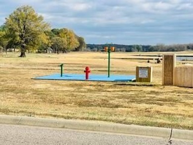 *Situated on the prestigious Hole 1 of Chamberlyne Golf Course on Chamberlyne Country Club in Arkansas - for sale on GolfHomes.com, golf home, golf lot