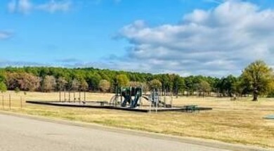 *Situated on the prestigious Hole 1 of Chamberlyne Golf Course on Chamberlyne Country Club in Arkansas - for sale on GolfHomes.com, golf home, golf lot