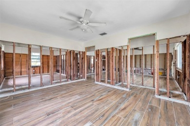 Property is located in a golf cartable neighborhood across the on The Dunedin Country Club in Florida - for sale on GolfHomes.com, golf home, golf lot