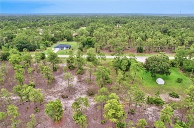 More than half acre. Convenient access to Interstate 75 on Lehigh Resort Club in Florida - for sale on GolfHomes.com, golf home, golf lot