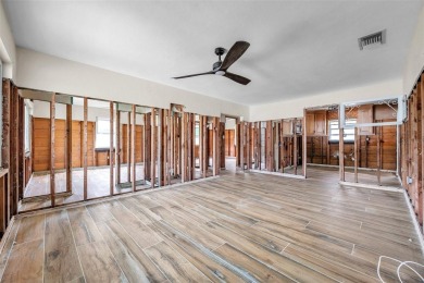 Property is located in a golf cartable neighborhood across the on The Dunedin Country Club in Florida - for sale on GolfHomes.com, golf home, golf lot