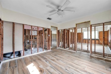 Property is located in a golf cartable neighborhood across the on The Dunedin Country Club in Florida - for sale on GolfHomes.com, golf home, golf lot