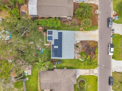 Property is located in a golf cartable neighborhood across the on The Dunedin Country Club in Florida - for sale on GolfHomes.com, golf home, golf lot