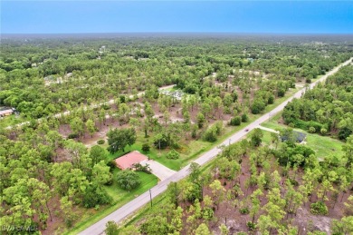 More than half acre. Convenient access to Interstate 75 on Lehigh Resort Club in Florida - for sale on GolfHomes.com, golf home, golf lot