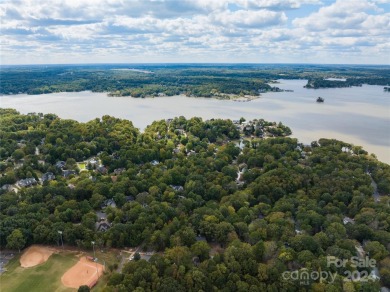 Welcome to this beautifully renovated 2BR/2BA home nestled in on Tega Cay Golf Club in South Carolina - for sale on GolfHomes.com, golf home, golf lot