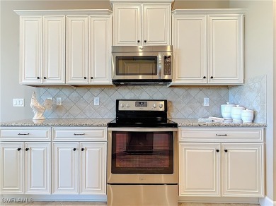 Magnificent Coach Home with Panoramic Water & Golf Course Views! on The Plantation Golf and Country Club in Florida - for sale on GolfHomes.com, golf home, golf lot