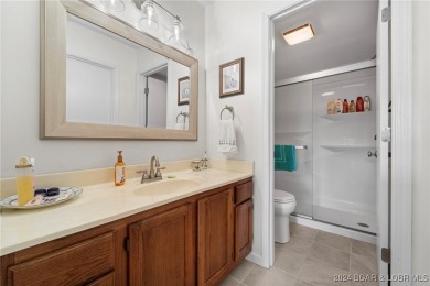 This beautiful 2-bedroom, 2-bath furnished end unit condominium on Seasons Ridge At Four Seasons in Missouri - for sale on GolfHomes.com, golf home, golf lot