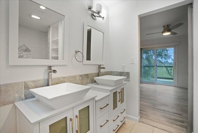 Enjoy effortless living in this stylishly renovated 2-bedroom, 1 on Rockport Country Club in Texas - for sale on GolfHomes.com, golf home, golf lot