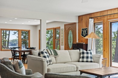 This beautiful Lake Mecosta property features 137 feet of nice on St. Ives Golf Club in Michigan - for sale on GolfHomes.com, golf home, golf lot