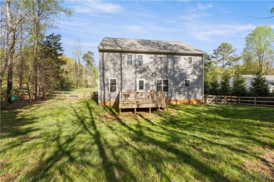 Nestled in the heart of Powhatan, this elegant two-story home on Mill Quarter Plantation Country Club in Virginia - for sale on GolfHomes.com, golf home, golf lot